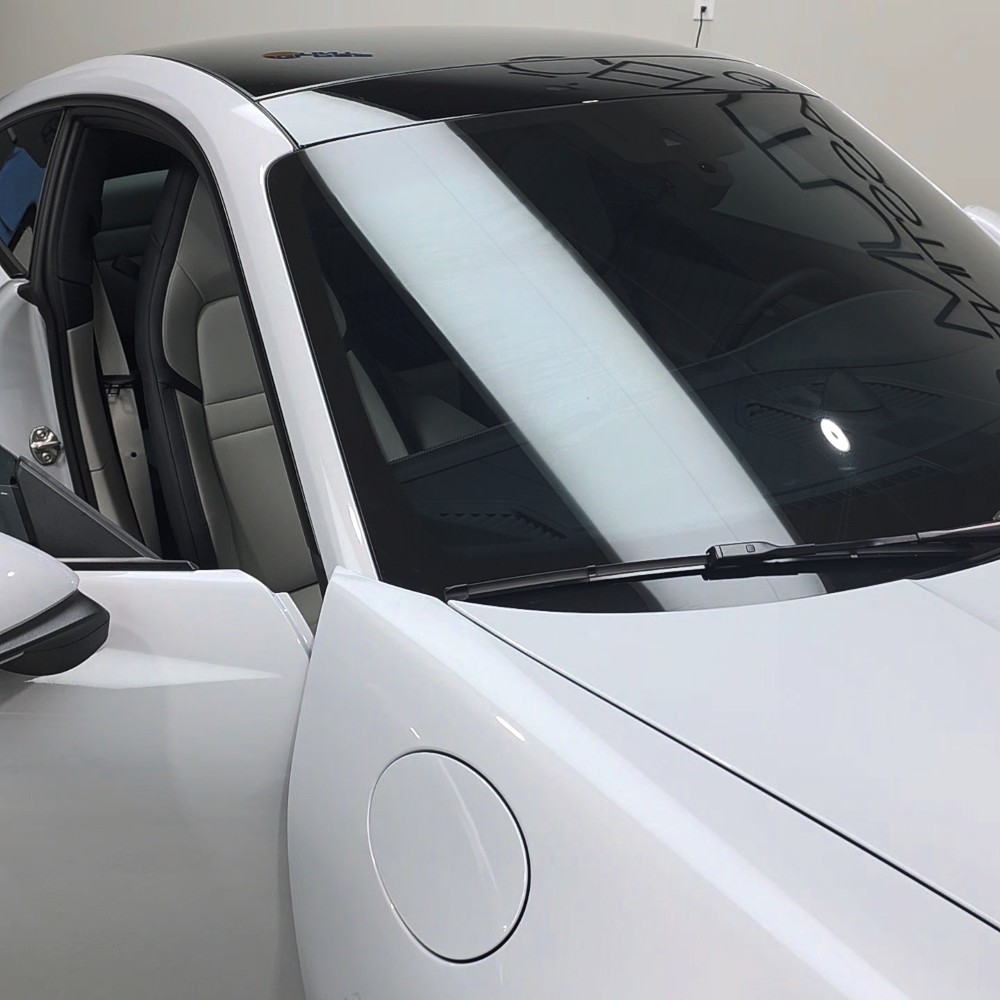 Porsche 992.2 GTS interior masking before windshield tint installation